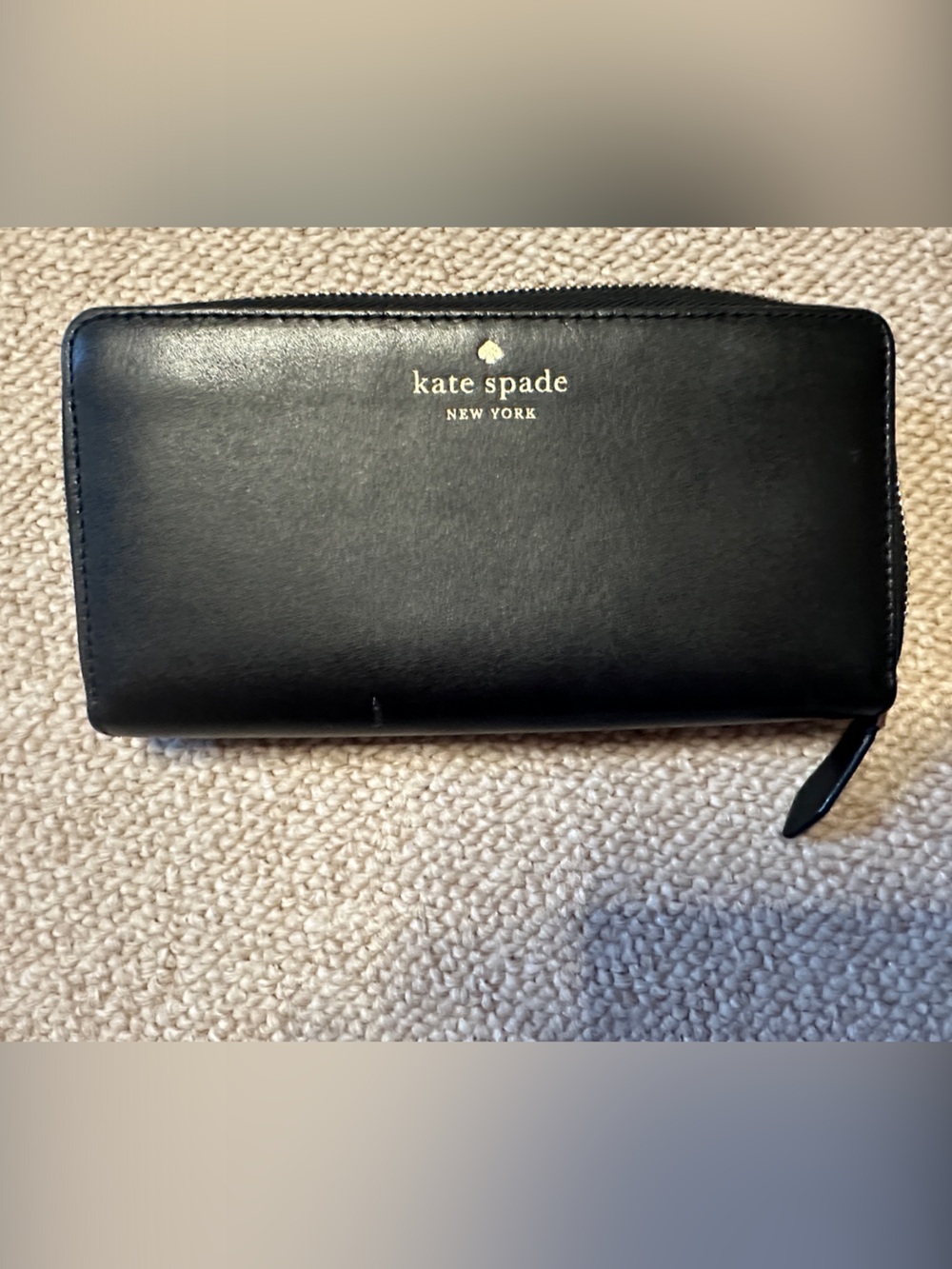kate spade black zip-around leather wallet with gold logo